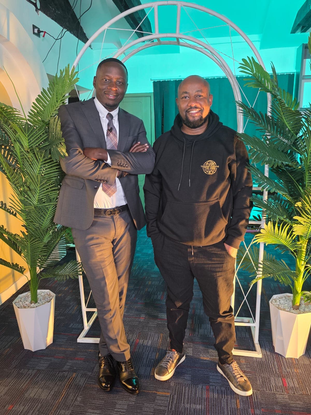 Keith Muoki with an entrepreneur he has mentored